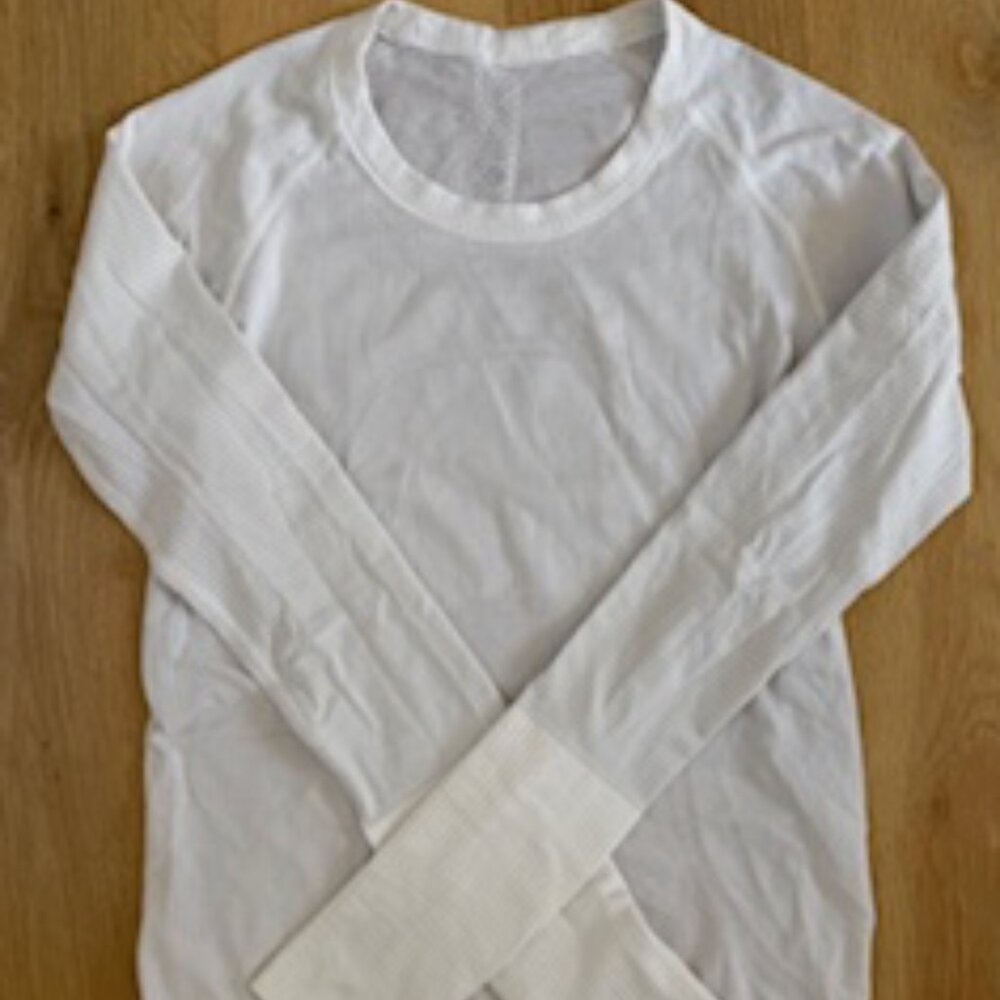 SWIFTY TECH LONG SLEEVE SHIRT 2.0 WAIST LENGHT SIZE: 6 WHITE